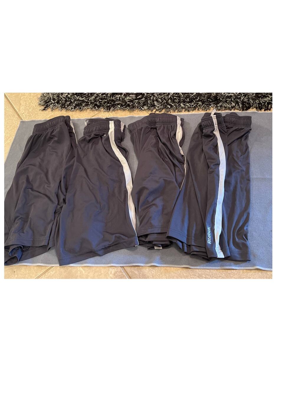 Reebok shorts 4 pairs medium